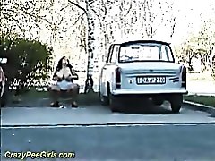 Pissing and pussy rubbing in public for curvy chick