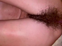 Slim and super hairy MILF does anal and squirts a lot