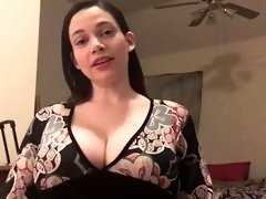 Busty stepmom gives a POV titjob before making herself cum