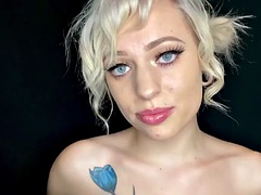 Blonde does a topless ASMR boob massage