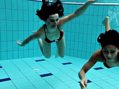 Nina Markova and Zlata Oduvanchik swimming naked in the pool